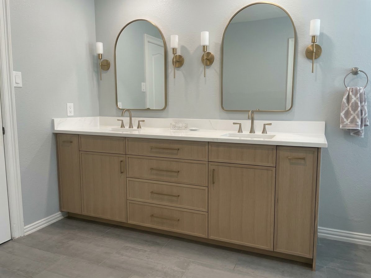 Custom double bathroom vanity in rift white oak with brass hardware