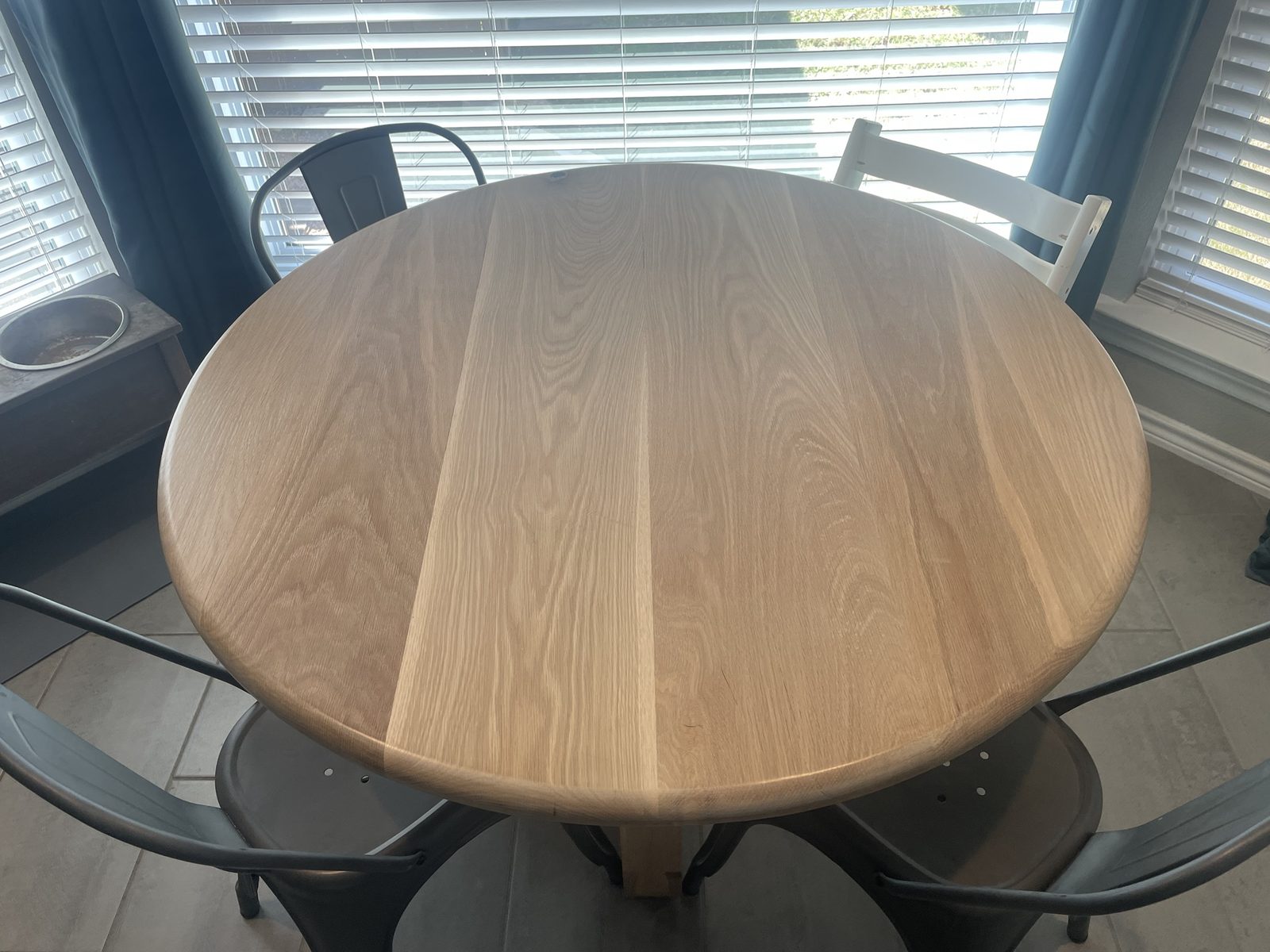 Custom round white oak dining table